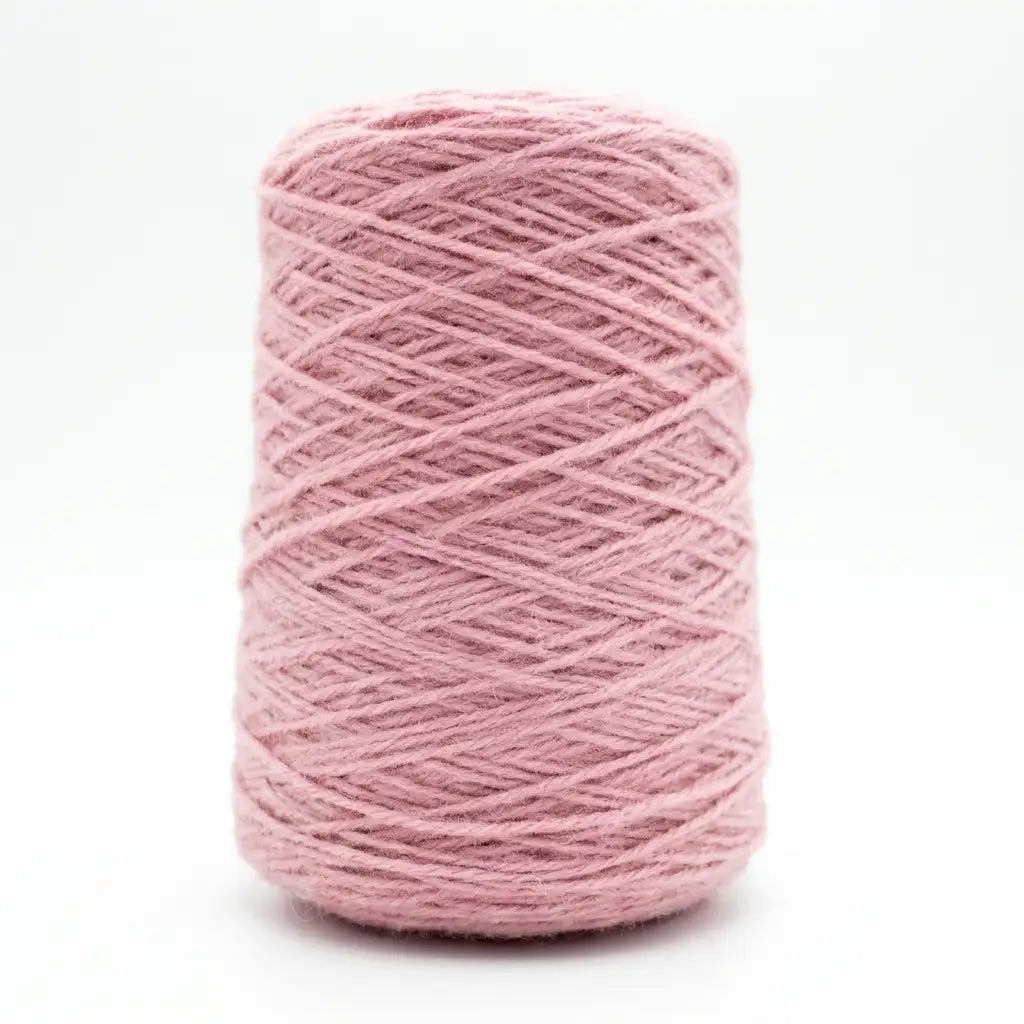 Pink skein of new zealand wool yarn on a white background