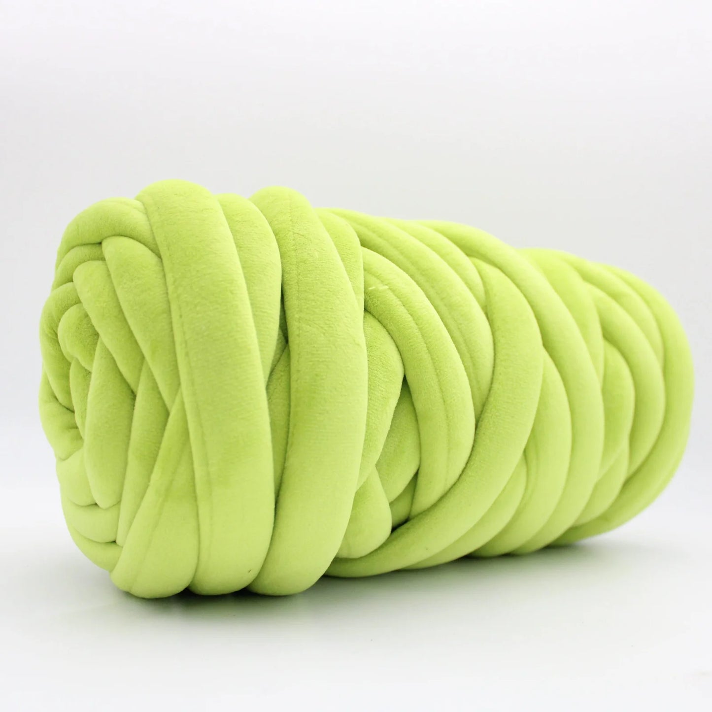 Chunky velvet apple green color yarn in white background