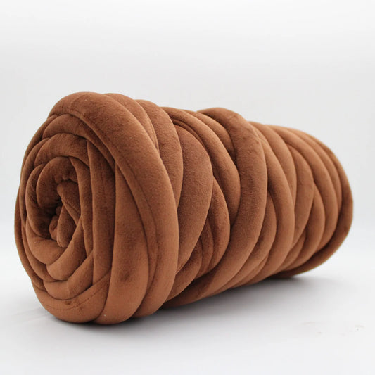 Brown chunky velvet yarn in a white background