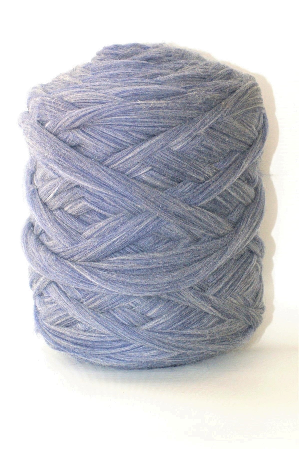 Denim skein of  chunky wool yarn on a white background