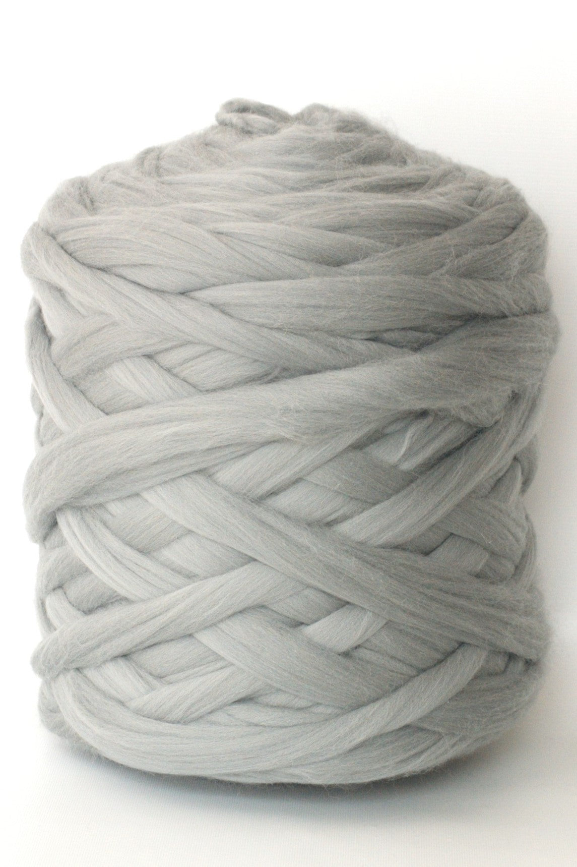 Gray skein of chunky wool yarn on a white background