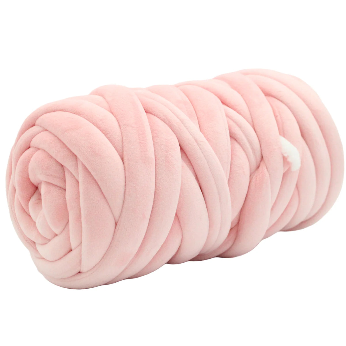 A light pink plush velvet tube yarn rolled into a cylindrical shape, shown against a plain white background.