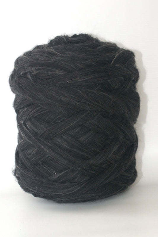 Ball of antracite wool yarn on a white background
