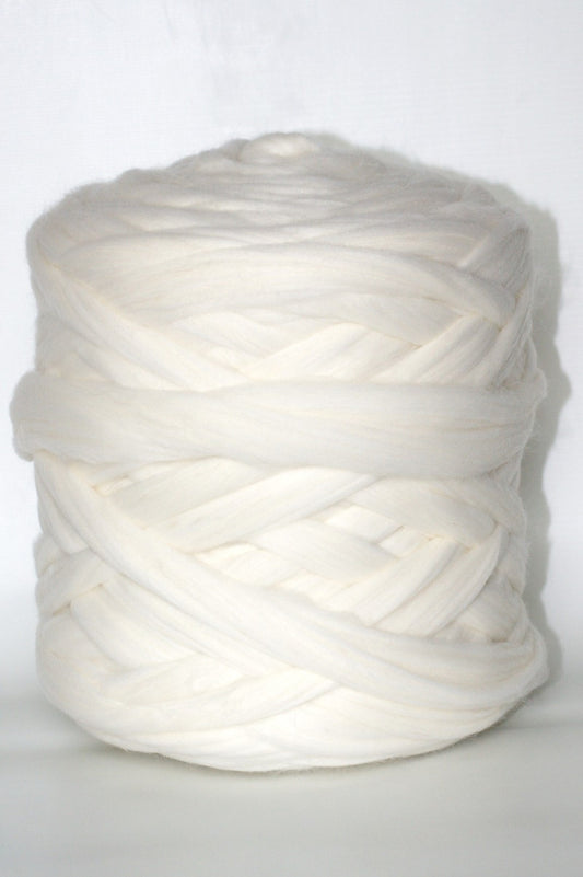 white colored chunky wool yarn ball on a white background