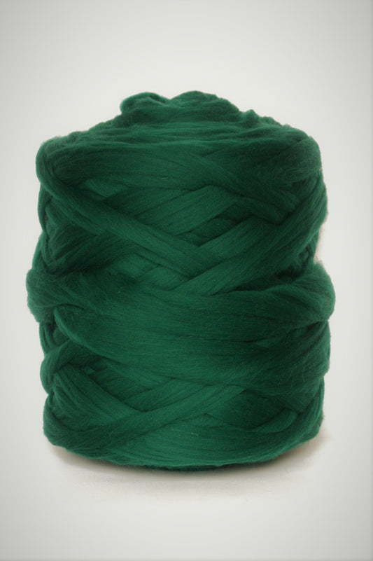 Emerald Green chunky wool yarn ball on a white background