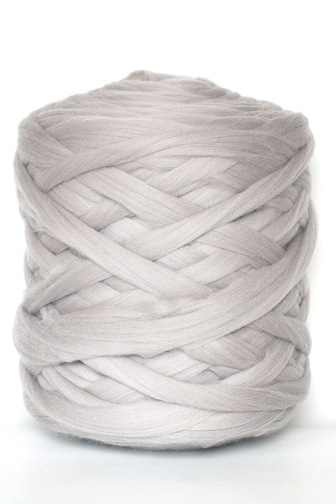 Ball of light  gray chunky wool yarn on a white background