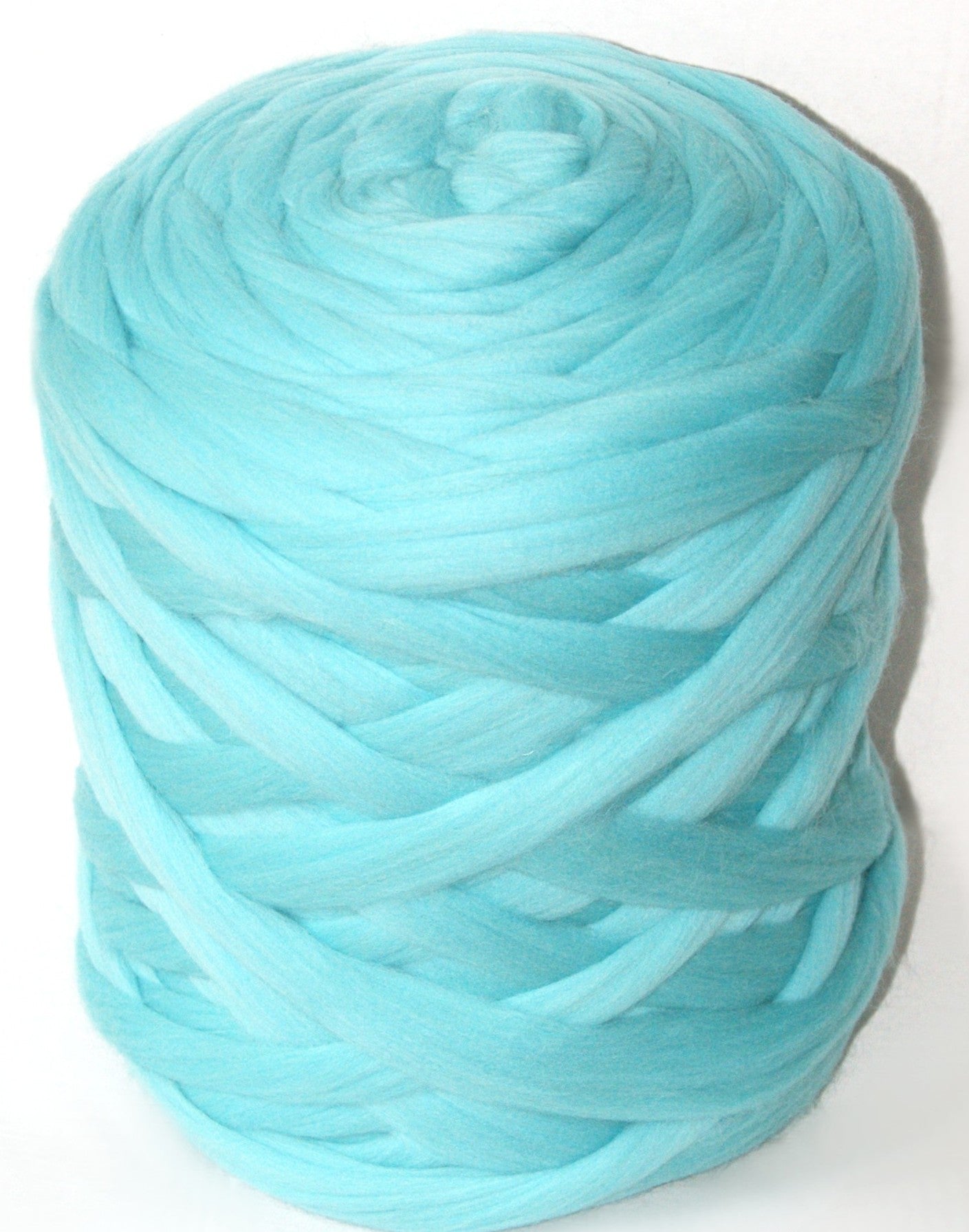 Mint chunky wool yarn ball on a white background