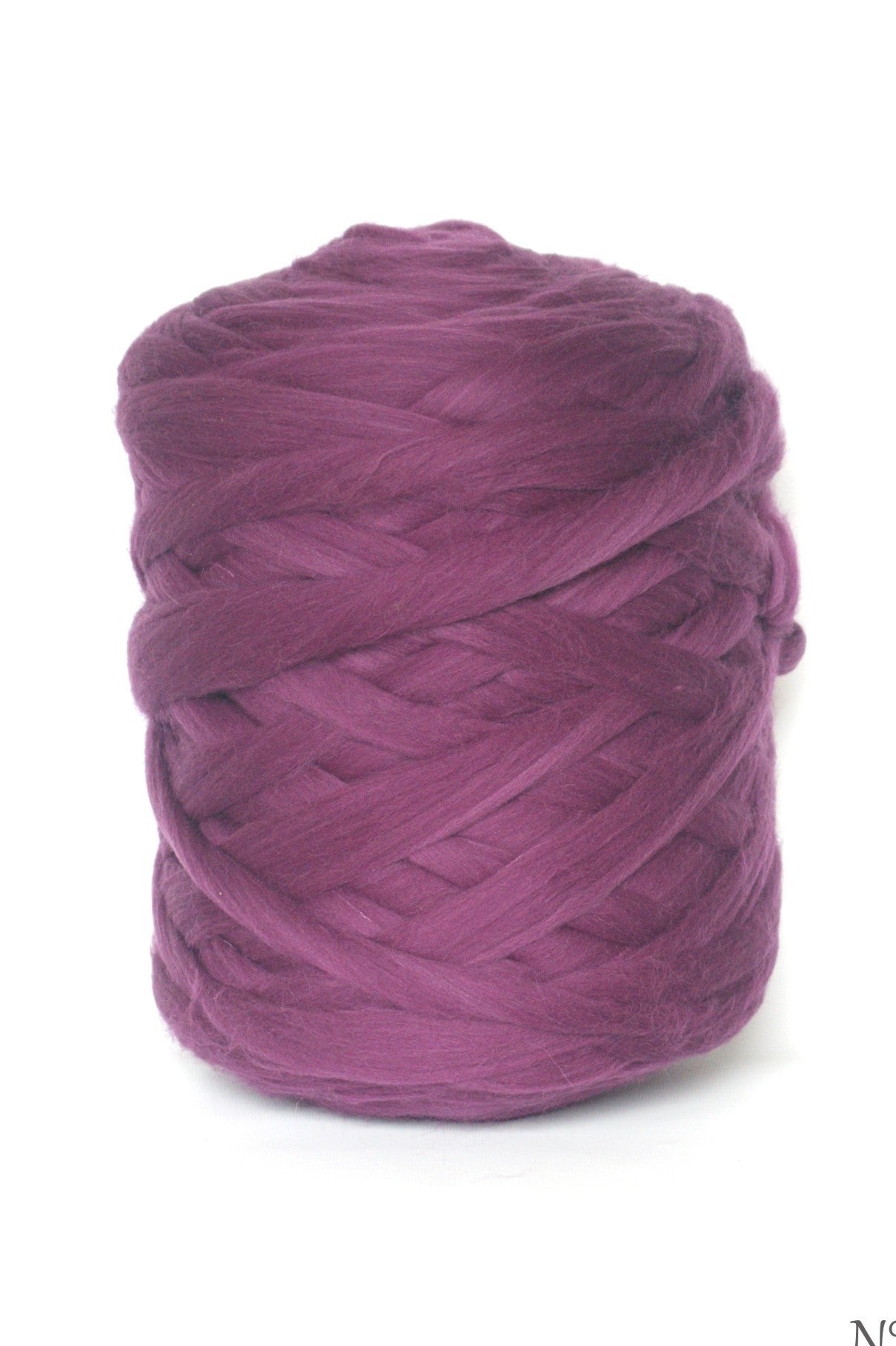 Purple chunky wool yarn ball on a white background