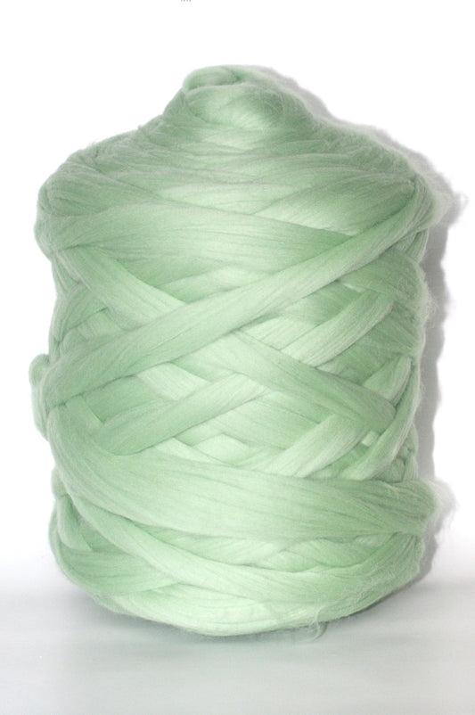 sage chunky wool skein of yarn on a white background