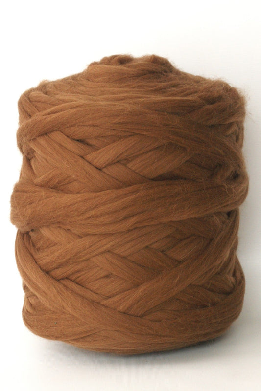 Brown chunky wool yarn ball on a white background